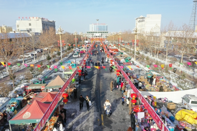 1月20日 二二四团年货街上年味十足.jpg